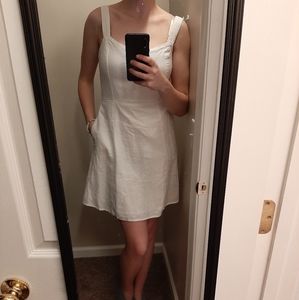 White linen dress with pockets